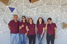 Alicia Quirós and her park team standing for a photo together